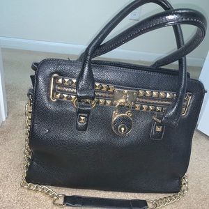 Black and gold handbag